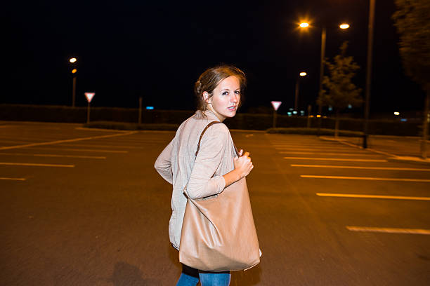 istock Scared young woman running from her pursuer 474378217