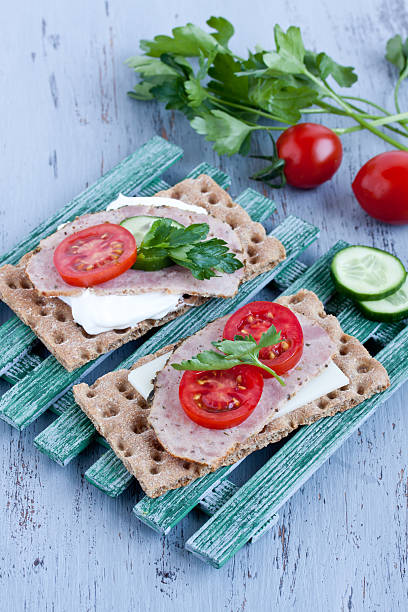 istock crisp bread with cheese and smoked turkey meat 474380854