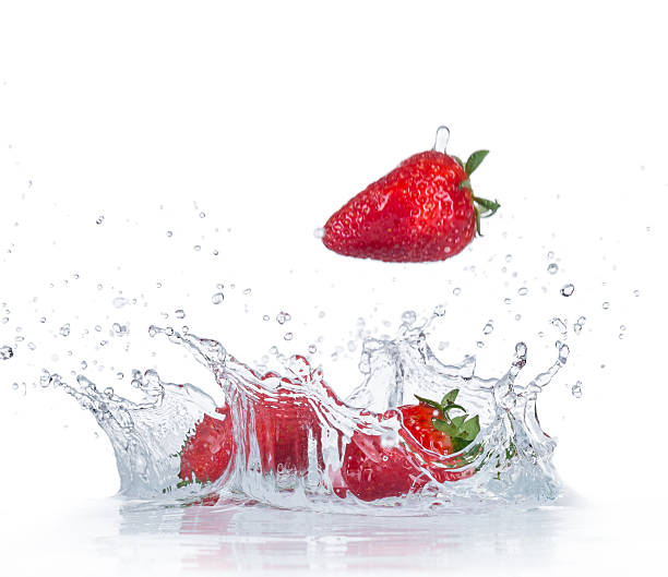 istock Fresh Strawberries with water splash 474381288
