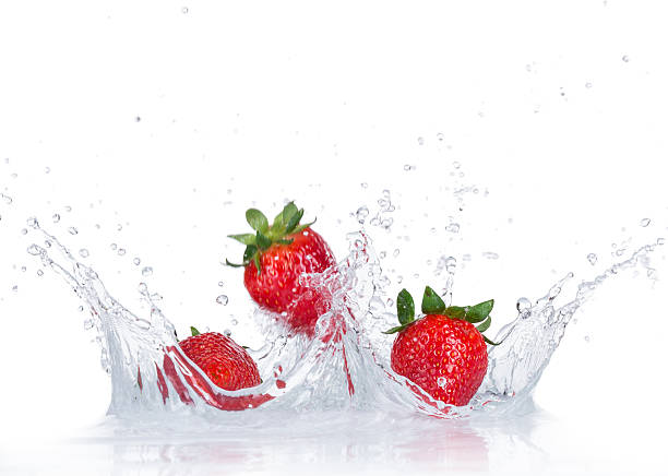 istock Fresh Strawberries with water splash 474381294
