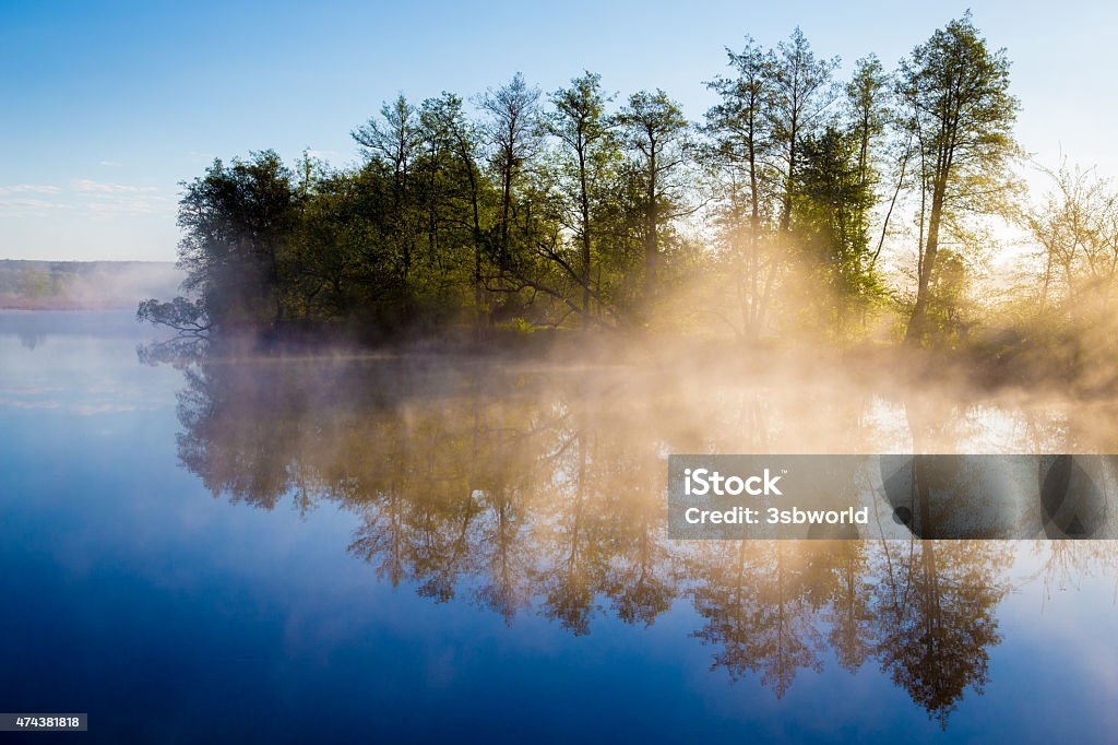 Morning fog on a calm river Morning fog on a calm river, tranquil scene. Vorskla river, Ukraine 2015 Stock Photo