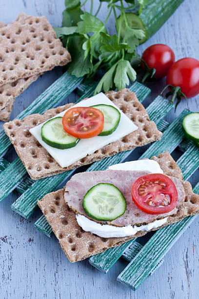 istock crisp bread with cheese and smoked turkey meat 474393314