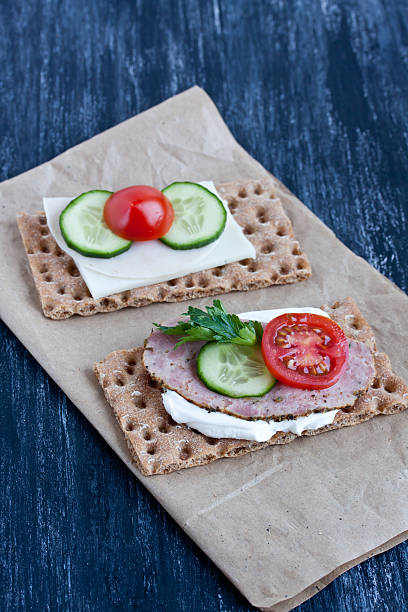istock crisp bread with cheese and smoked turkey meat 474393482