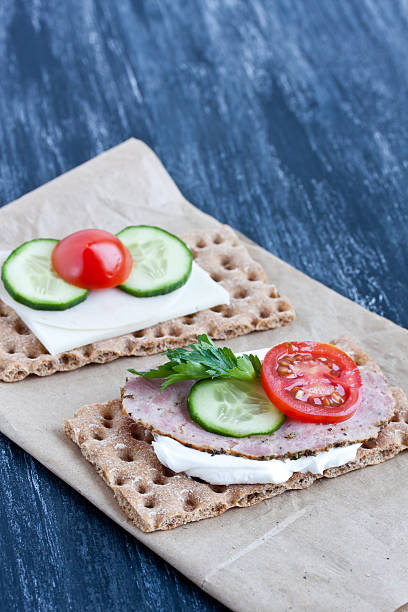 istock crisp bread with cheese and smoked turkey meat 474393620