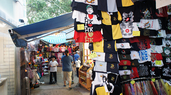 Hong Kong, China - April 19, 2015: Tourist walk down to the Shopping Market in Stanley Bay, Hong Kong. Stanley is a popular destination for shopping and relaxation in Hong Kong