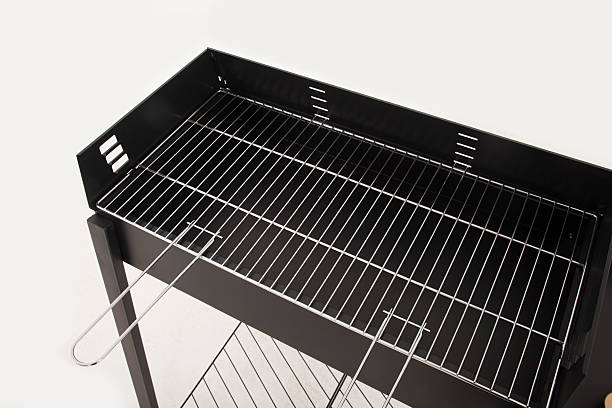 istock New and empty barbecue grill on white 474394246