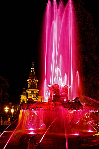 istock Red illuminated fountain on the Plaza Opera in Timisoara 474394688