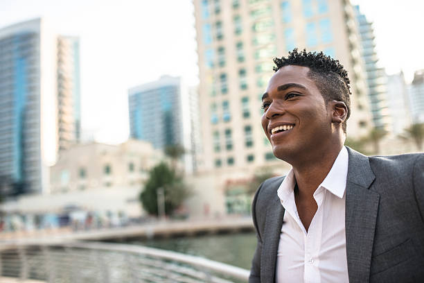 istock Elegant man on Dubai marina promenade 474395214