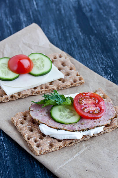 istock crisp bread with cheese and smoked turkey meat 474395496