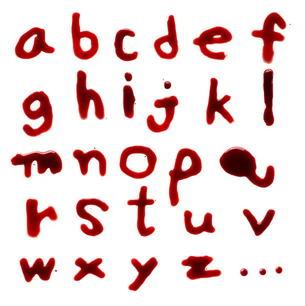 Photo of Letters A-Z (English lowercase) dripping with blood on white bac