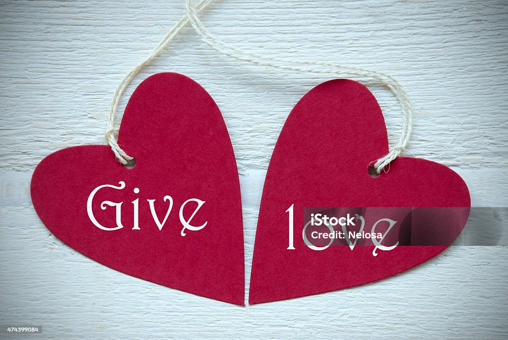 Two Red Hearts With Give Love Two Red Hearts Label Or Tag With White Ribbon On White Wooden Background With English Text Give Love Vintage Retro Or Rustic Style With Frame 2015 Stock Photo