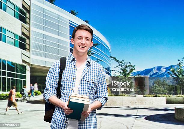 College Student Standing Outside Campus Stock Photo - Download Image Now - Brigham Young University, 20-29 Years, 2015
