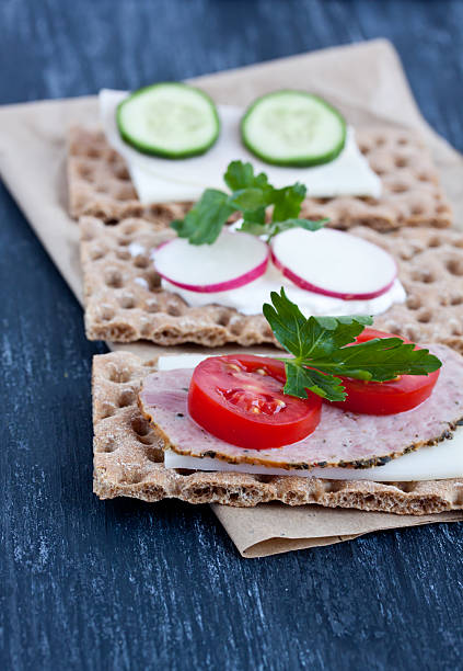 istock crisp bread with cheese and smoked turkey meat 474402788