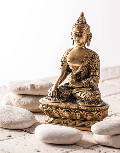 istock Buddha for zen attitude on mineral background 474405508