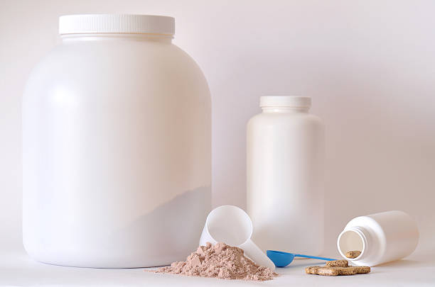 istock Big jar of protein powder, bottle, pills and tablets 474405562
