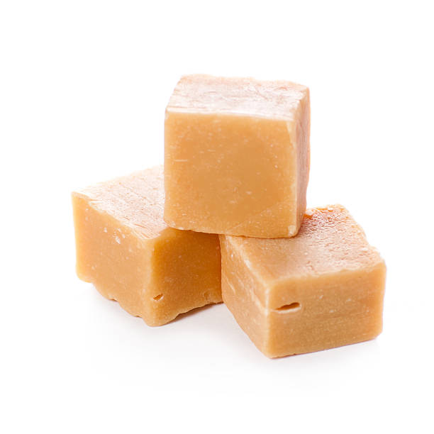 istock Tasty caramel heap isolated with a white background 474406394
