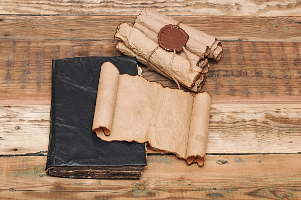 istock Scrolls of vintage paper with seal wax 474409969