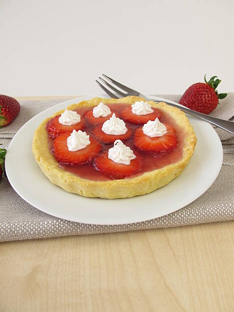 istock Cake with strawberries and sugar cream decoration 474410432
