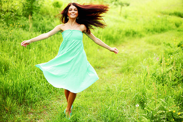 Enjoy your pregnancy. Happy pregnant woman spending time in nature.