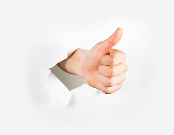 hand with thumbs up stock photo