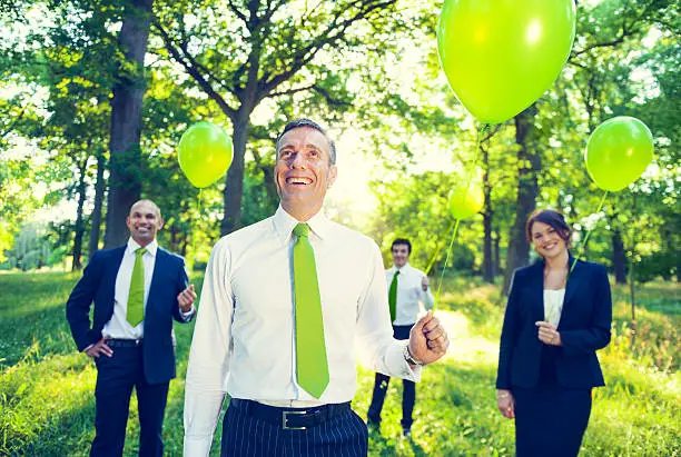 Photo of Group of Business People in the Park