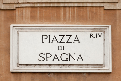 Piazza di Spagna  sign on a wall at Piazza di Spagna, Rome Italy