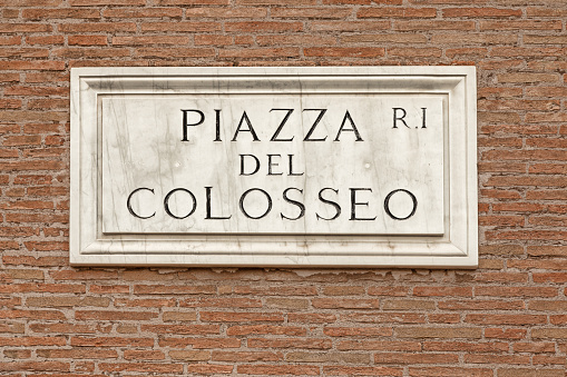 Piazza Del Colosseo  sign on a wall at Piazza Del Colosseo, Rome Italy