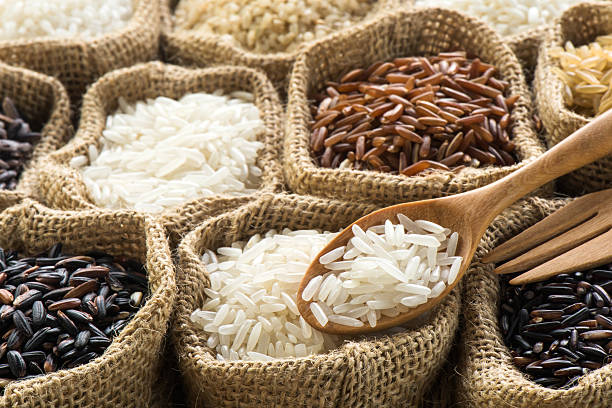 istock Group of organics rice in burlap bag 474414116