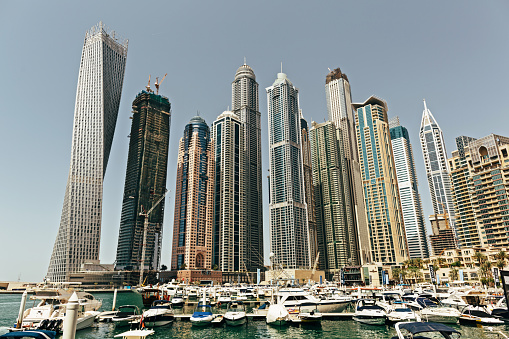 Incredible panorama of Dubai during the day. There are also appear part of Dubai Marina.