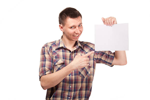 istock Man in a plaid shirt with blank white board 474416479