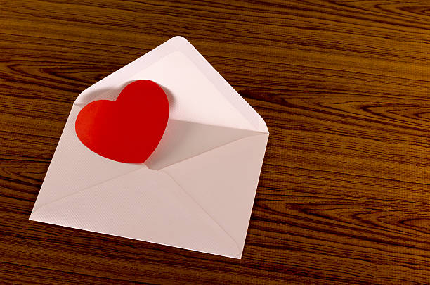istock red heart with pink envelope 474417083