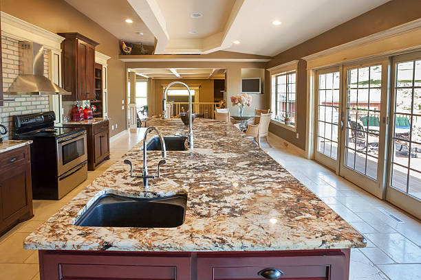 Showcase Kitchen With Marble Center Island Showcase Kitchen With Marble Center Island domestic kitchen cabinet elegance showcase interior stock pictures, royalty-free photos & images