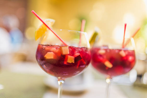 Sangria Two refreshing glasses of sangria with fruits, waiting to be savored. sangria stock pictures, royalty-free photos & images
