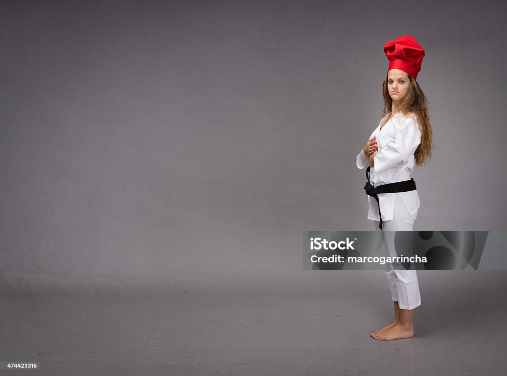 oriental chef with copy space on background oriental chef with copy space on background, red hat Martial Arts Stock Photo
