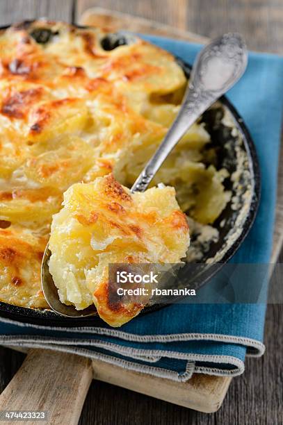 Potato Gratin With Cream And Cheese Stock Photo - Download Image Now - Baked, Blue, Casserole