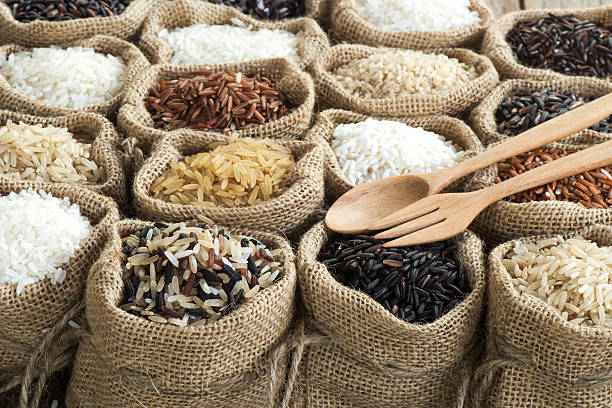 istock Group of organics rice in burlap bag 474424582
