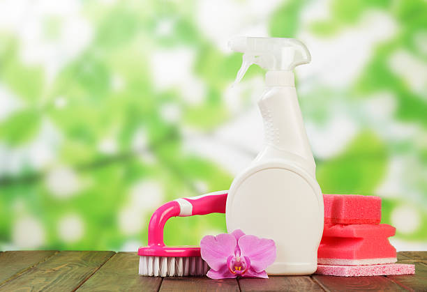istock Cleaning products and pink flower 474424806