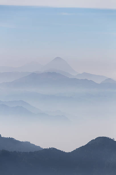 istock Misty volcano peaks in the distance 474428742