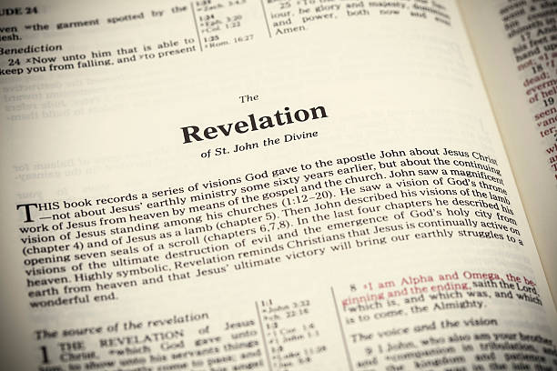 Open Bible ,The Book of Revelation Open Bible ,The Book of Revelation Armageddon Bible stock pictures, royalty-free photos & images