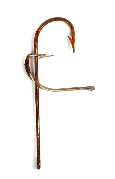 istock Letter F composed of old rusty fish hooks 474429122