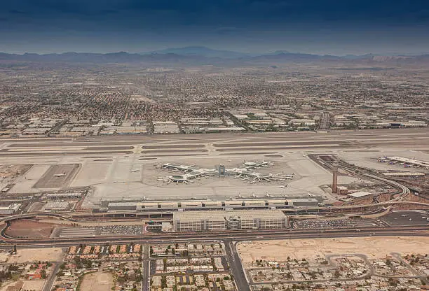 Las Vegas McCarran International Airport photographed from a helicopter. Showing part of the runway and terminals