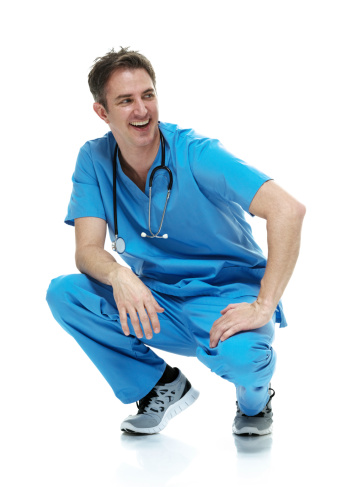 Cheerful male nurse crouchinghttp://www.twodozendesign.info/i/1.png