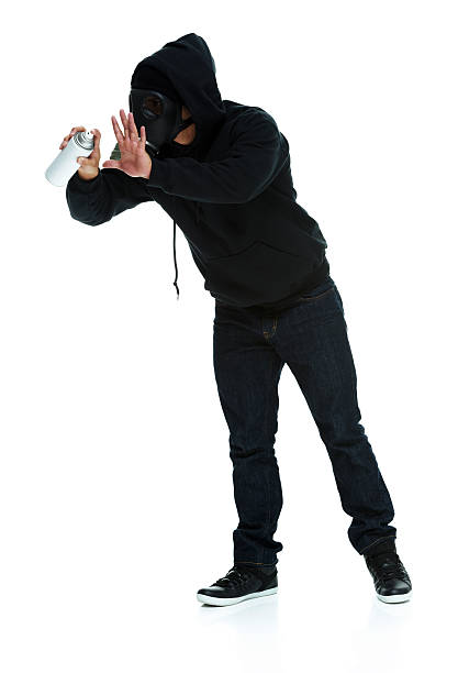 istock Graffiti artist in action with aerosol can 474429669