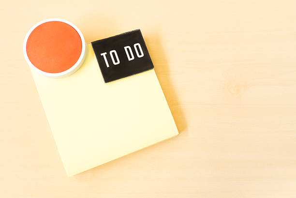 istock To Do List on Yellow Sticky Paper Note 474429814