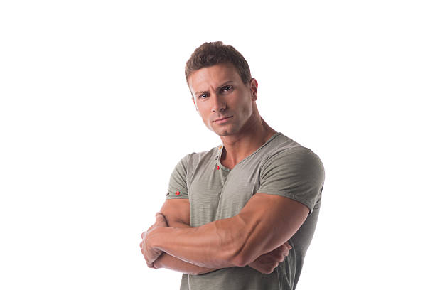 istock Fit handsome young man standing confident with arms crossed 474435720