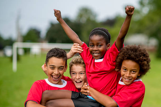 istock Little Kids Cheering in Victory 474436110