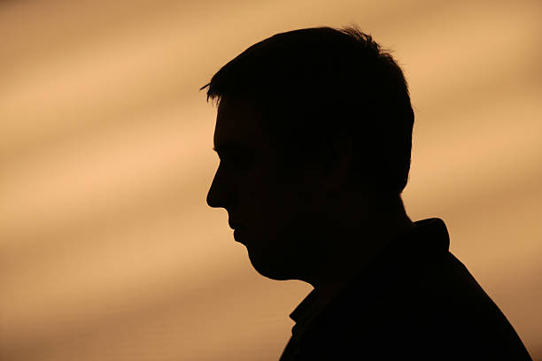 istock Male portrait back lit 474438903