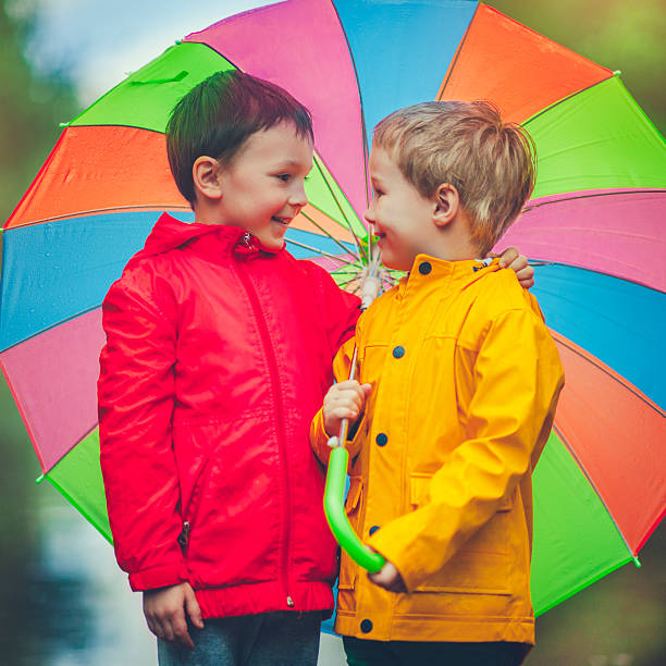 istock Little boys in rain 474440642