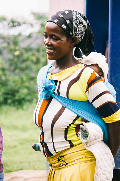 istock African woman with his baby 474443750