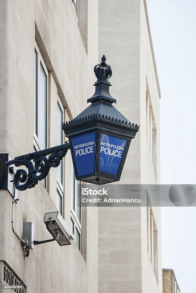 Metropolitan Police lantern in London Close-up of a traditional police lantern, on display outside a metropolitan police station in the center of London, England. Metropolitan Police Stock Photo